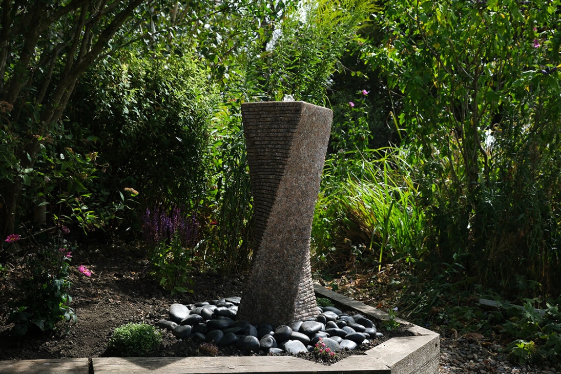 Transforming Our Garden with the Eastern Connections Pinky Granite Water Feature